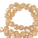 Faceted glass beads 4mm round Chadwick brown-pearl shine coating